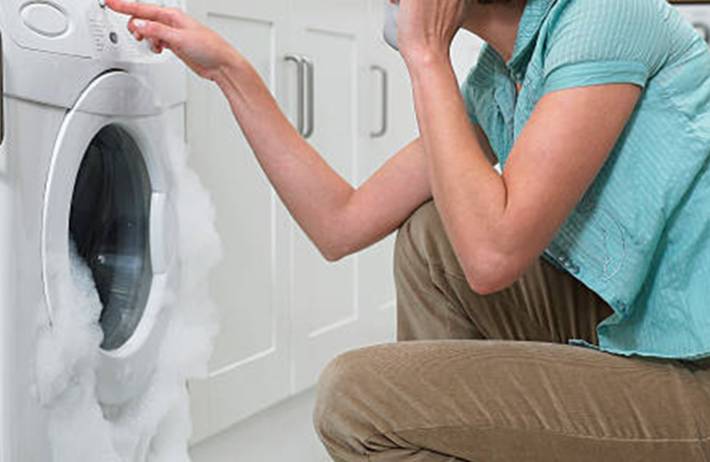 machine à laver qui mousse